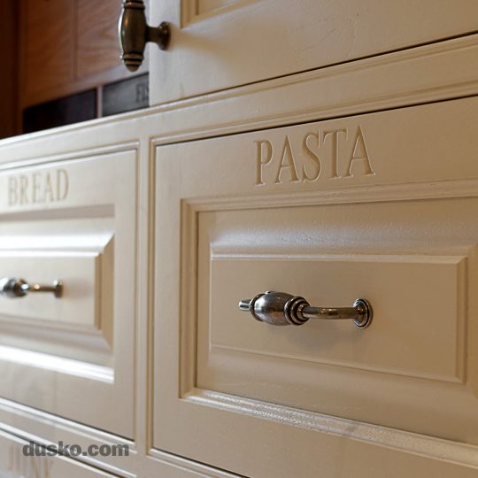 Colonial Style Kitchen in Prestbury, Cheshire Engraved drawer fronts